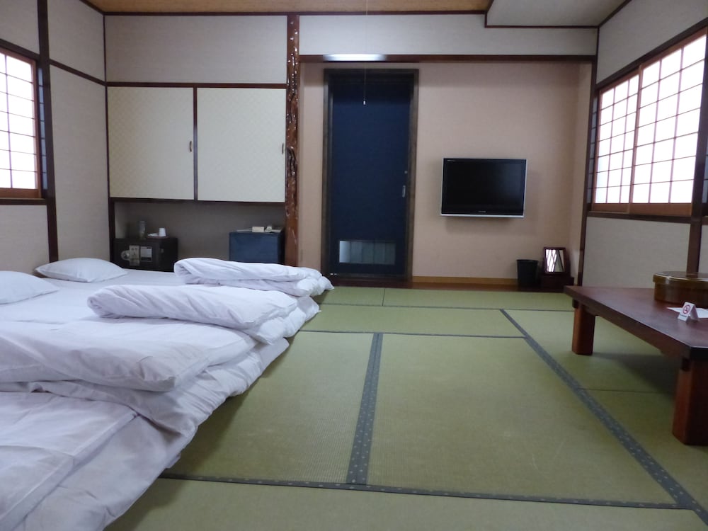 Фото Minshuku Kuwataniya