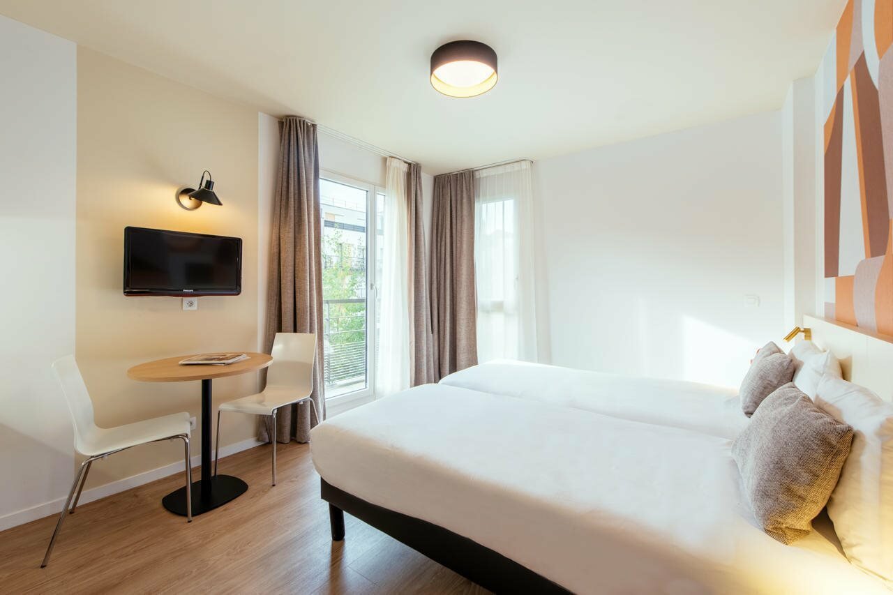 Фото Adagio Access Paris Asnières Aparthotel