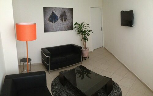 Гостиница Australia Suites Ejecutivas в Леоне