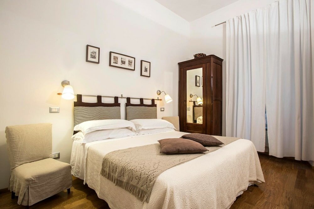 Фото Arco del Lauro Bed & Breakfast