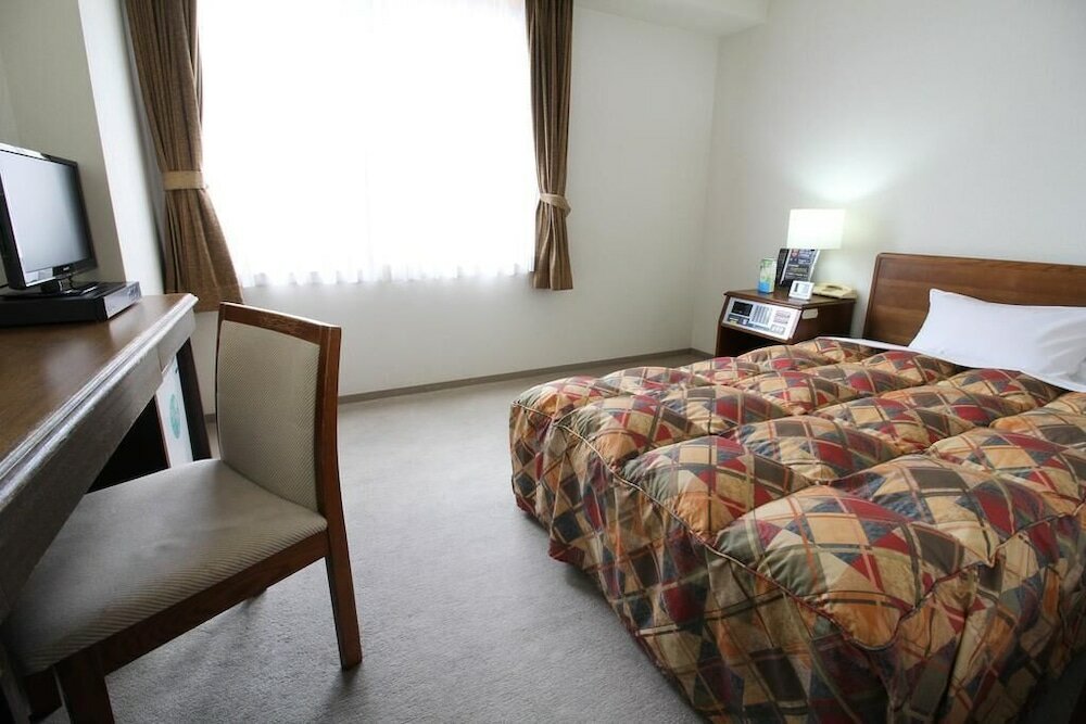 Фото Neyagawa Trend Hotel