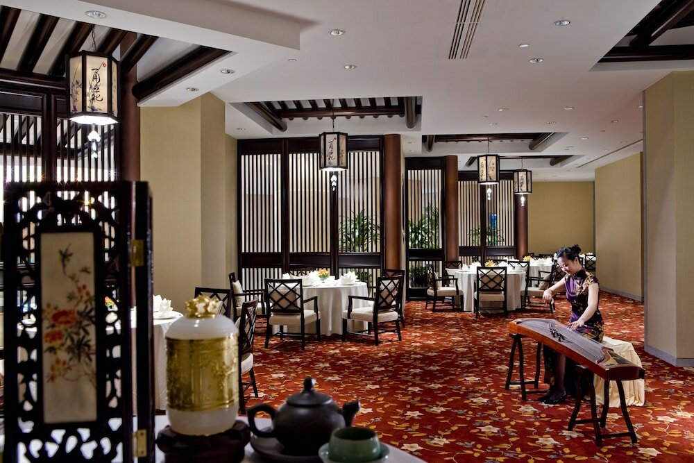 Фото Ningbo Nanyuan Universe Deluxe Hotel