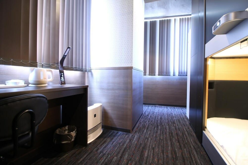 Фото Sejour Inn Capsule