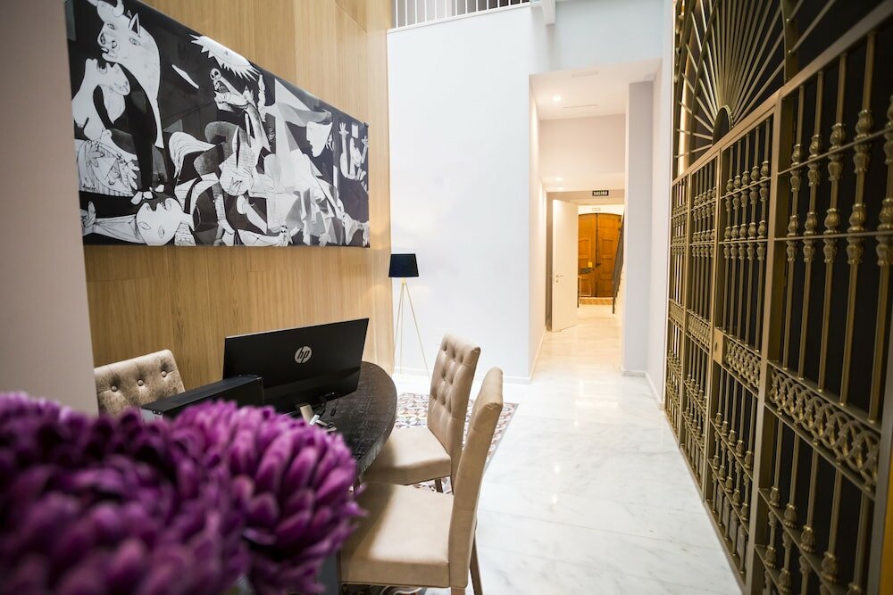 Фото Casa de la Merced Suites