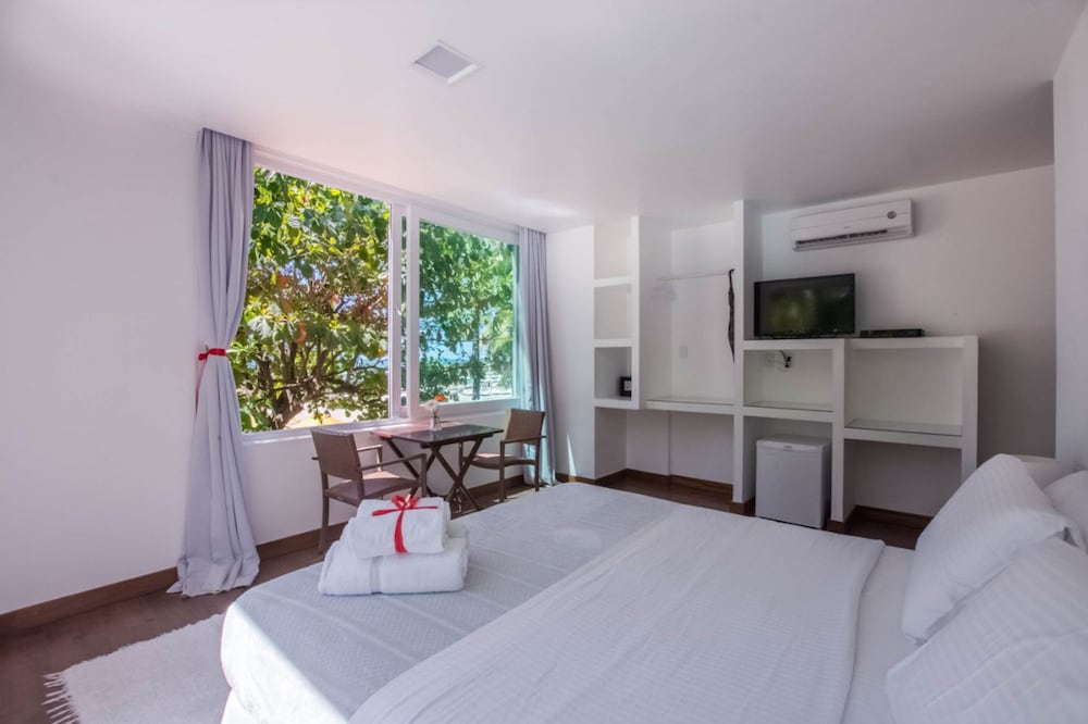 Фото Sambass lounge beach cafe & Pousada