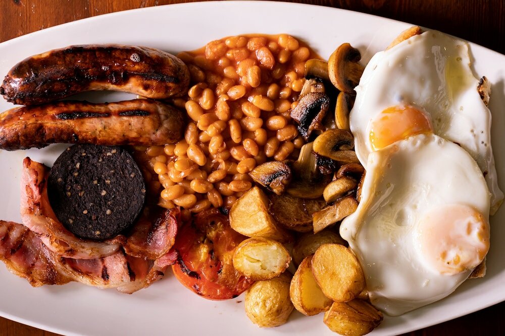 Фото The New Inn by Roomsbooked