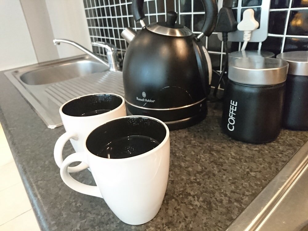 Фото The Square Apartments by Ctha