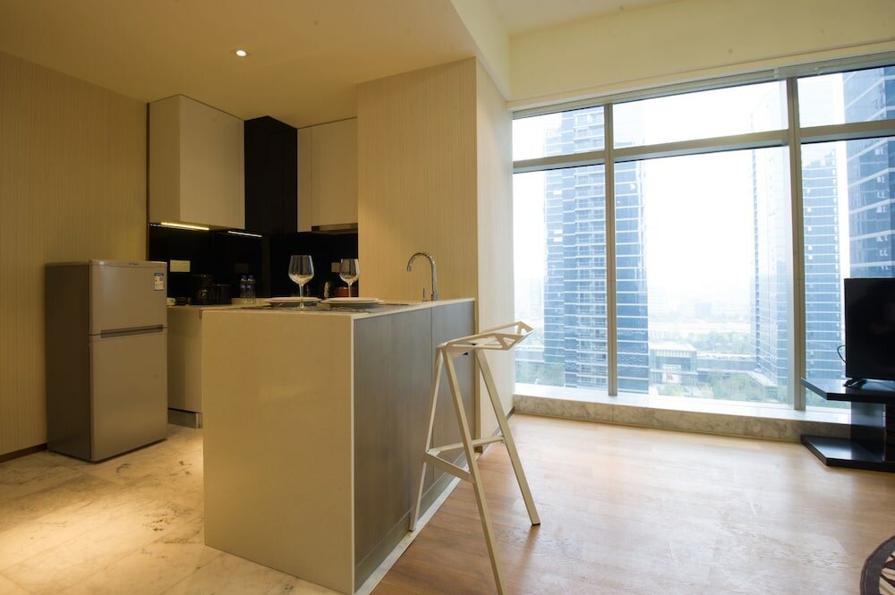 Фото Oakmade International Service Apartment