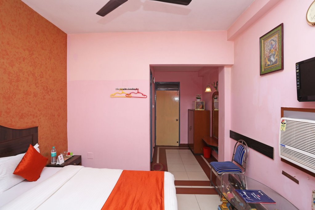 Фото Capital O 6077 Hotel Ashraya