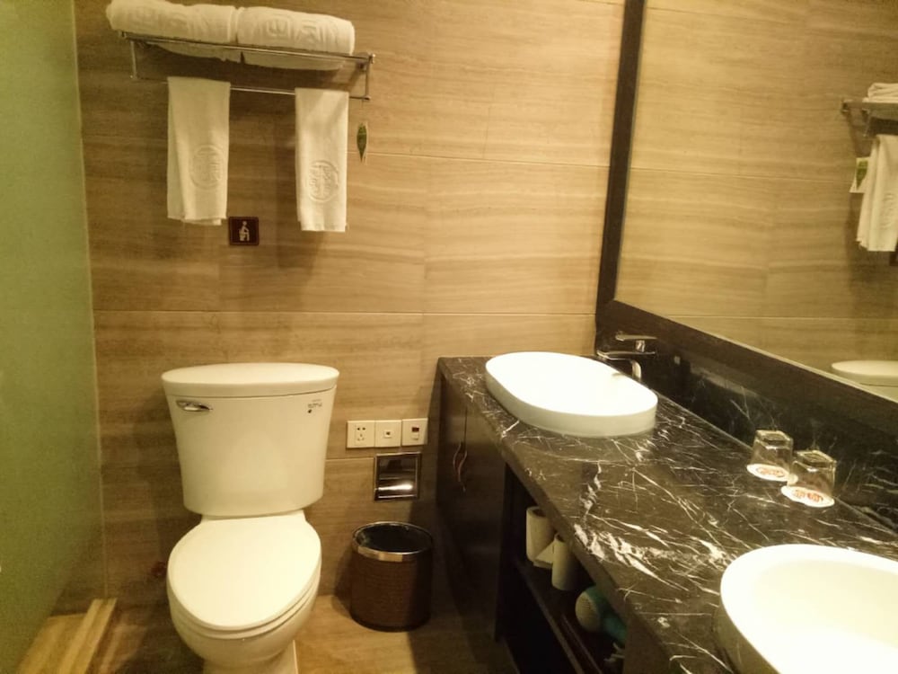 Фото Qiao Garden Vacation Hotel