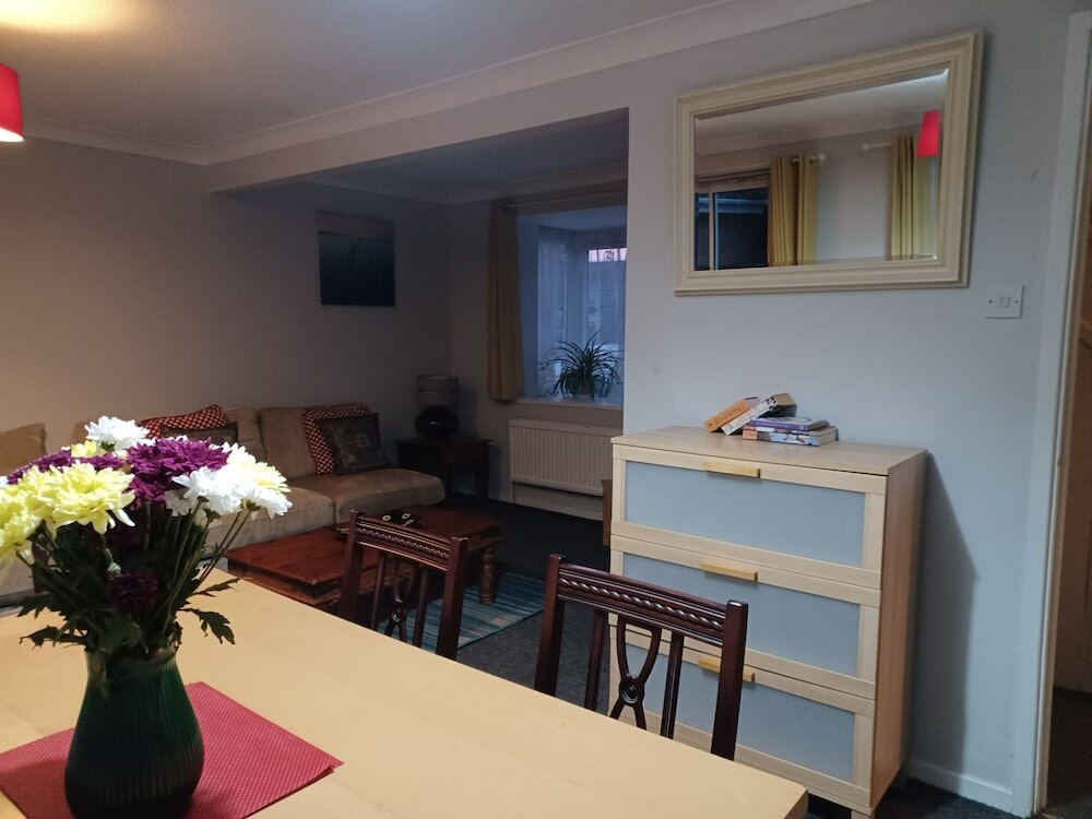 Фото Huku Kwetu - Fieldfare Green