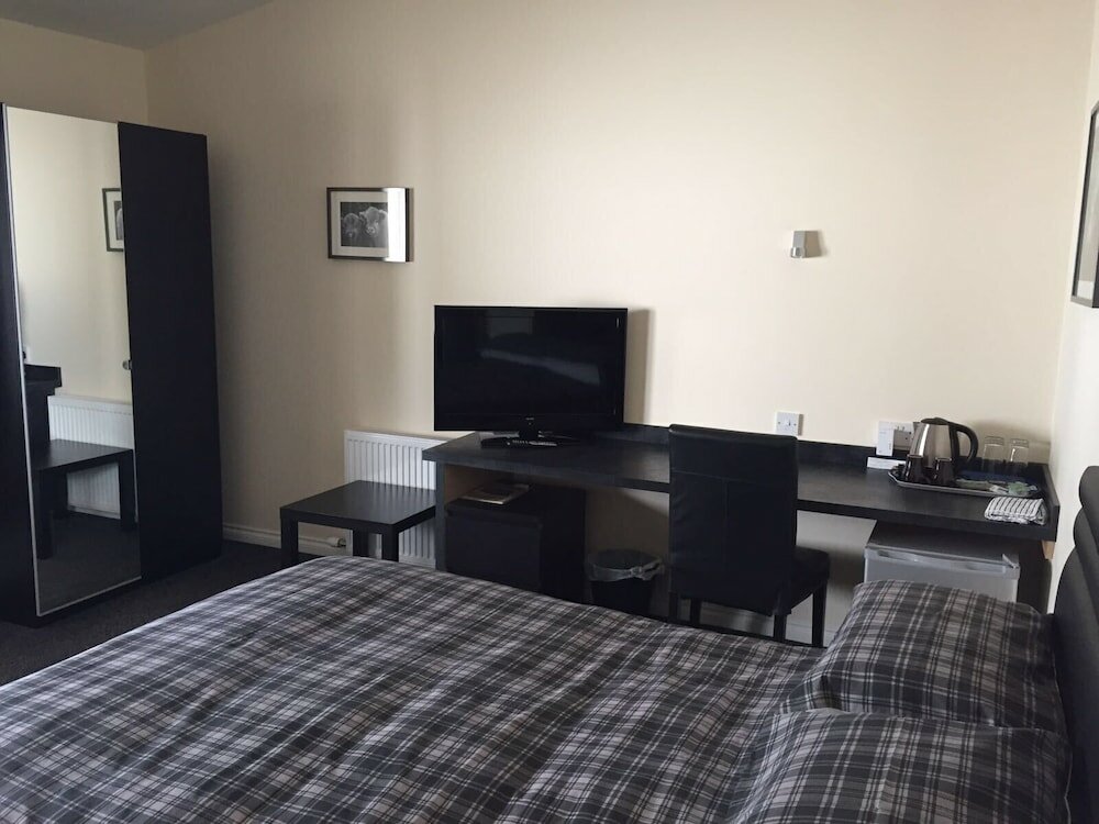 Фото Ivy Cottage Serviced Accommodation