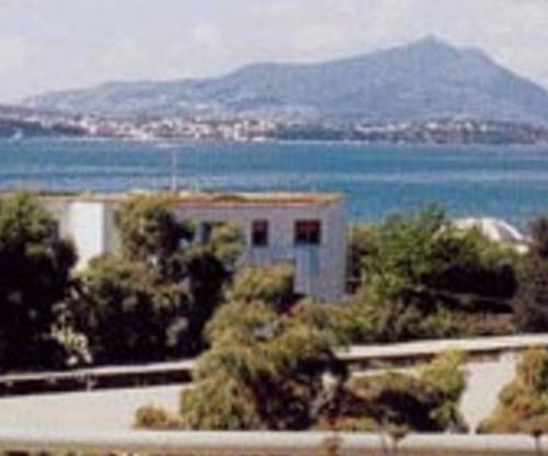 Гостиница Flegrea House - Casa Rosa в Поццуоли