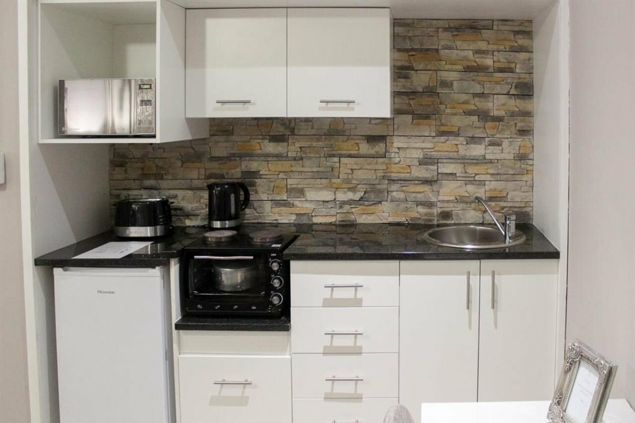 Фото A Queenslin Guesthouse