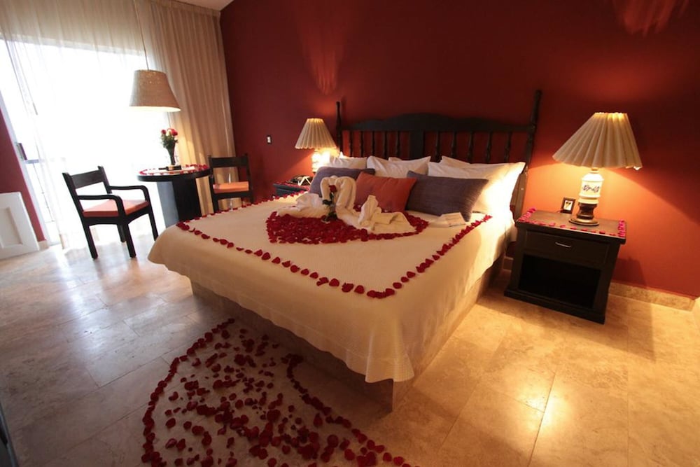 Фото Hotel Montetaxco