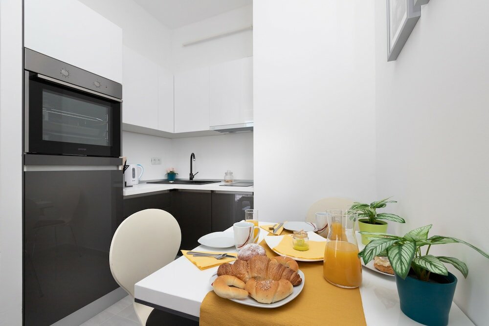 Фото Tesla Boutique Apartments & Rooms