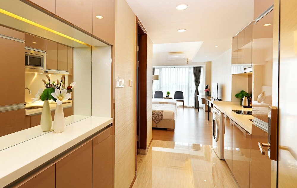 Фото Yuwa Serviced ApartHotel