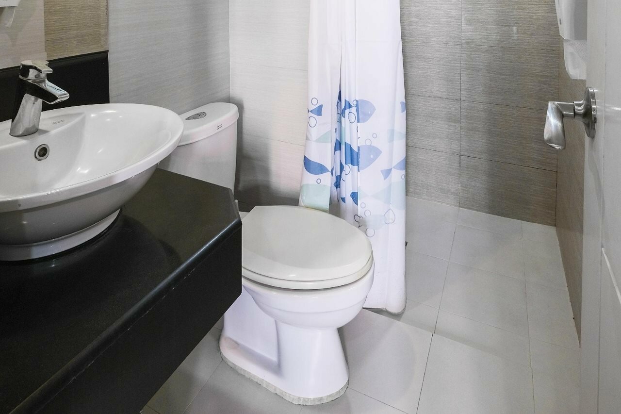 Фото Tess and Tessha Condotel near T3 Airport