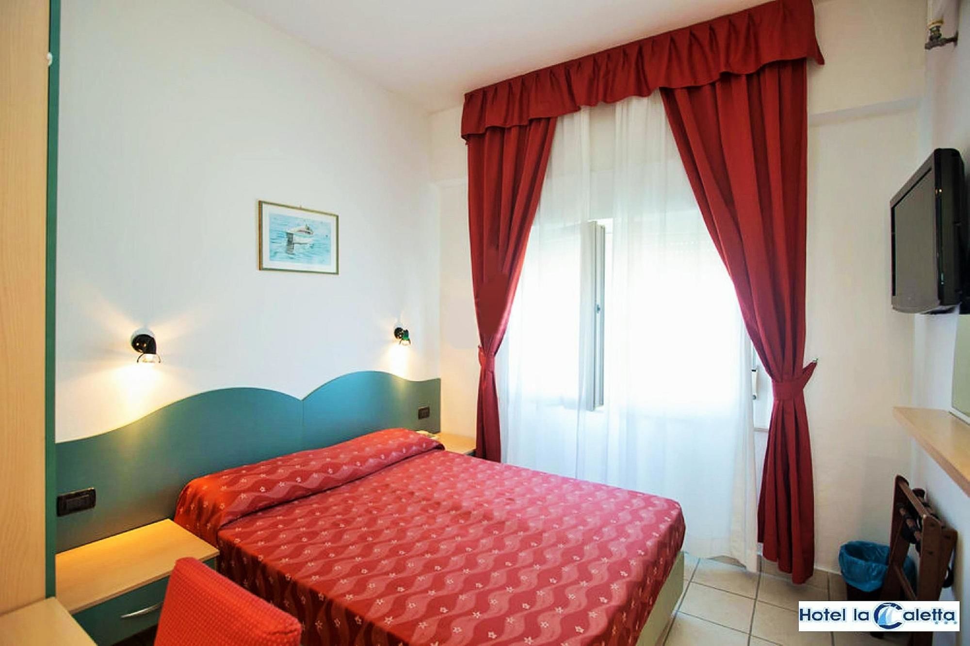 Фото Hotel La Caletta