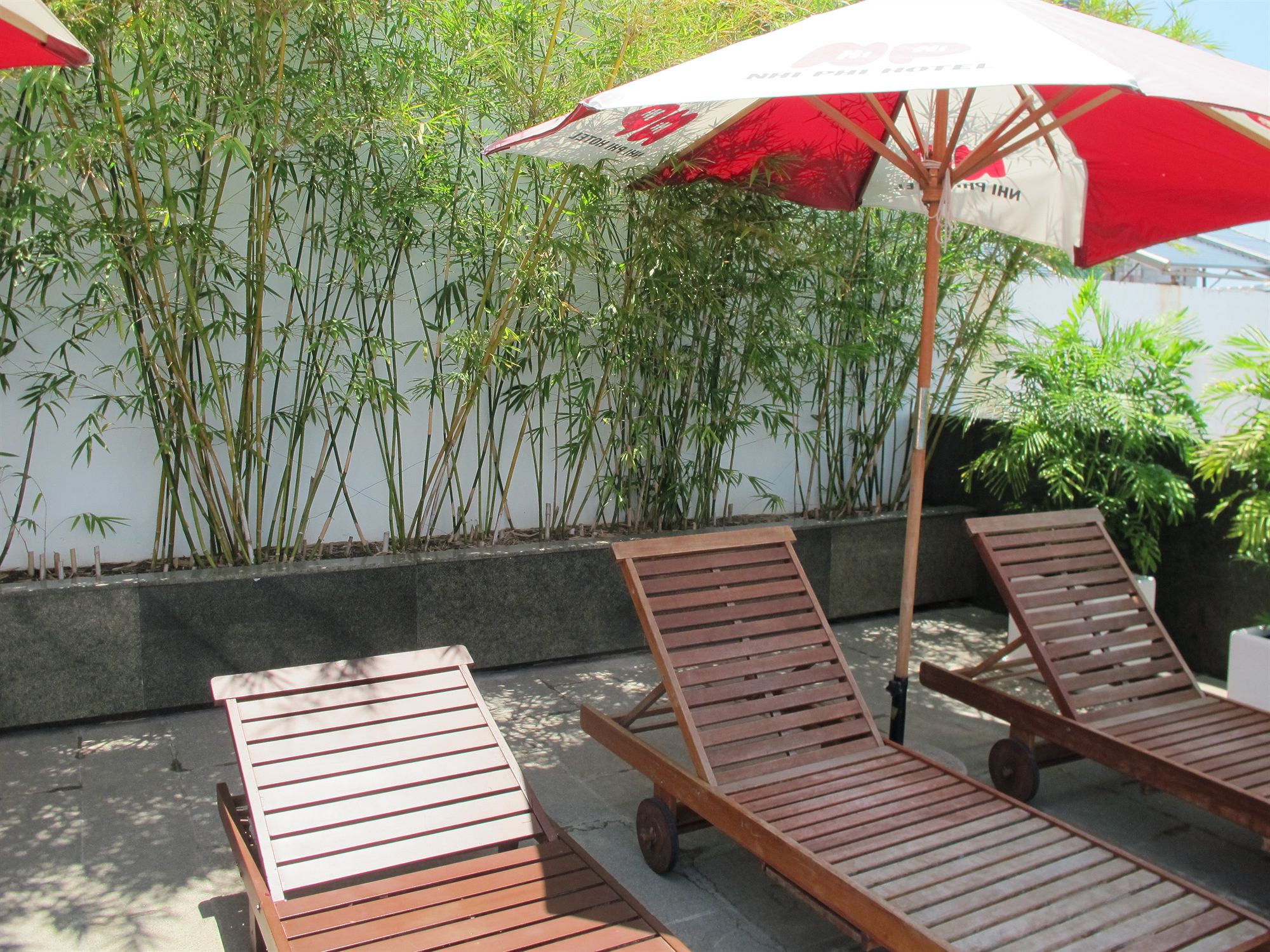 Фото Nhi Phi Hotel