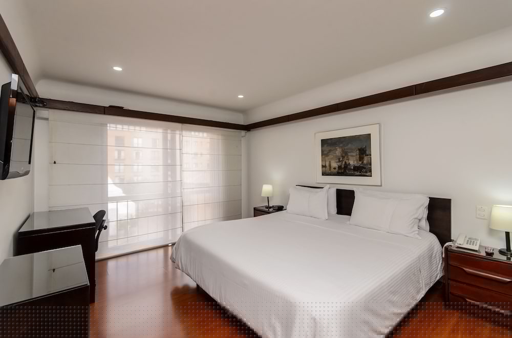 Фото Travelers Suites Condominio Plenitud