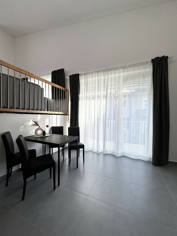 Фото Grazora Living Apartments