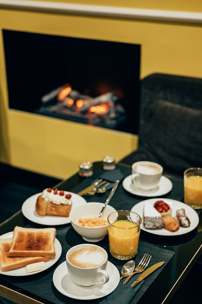 Фото Caruso Place Boutique & Wellness Suites