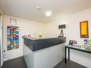 Гостиница Bellano Motel Suites