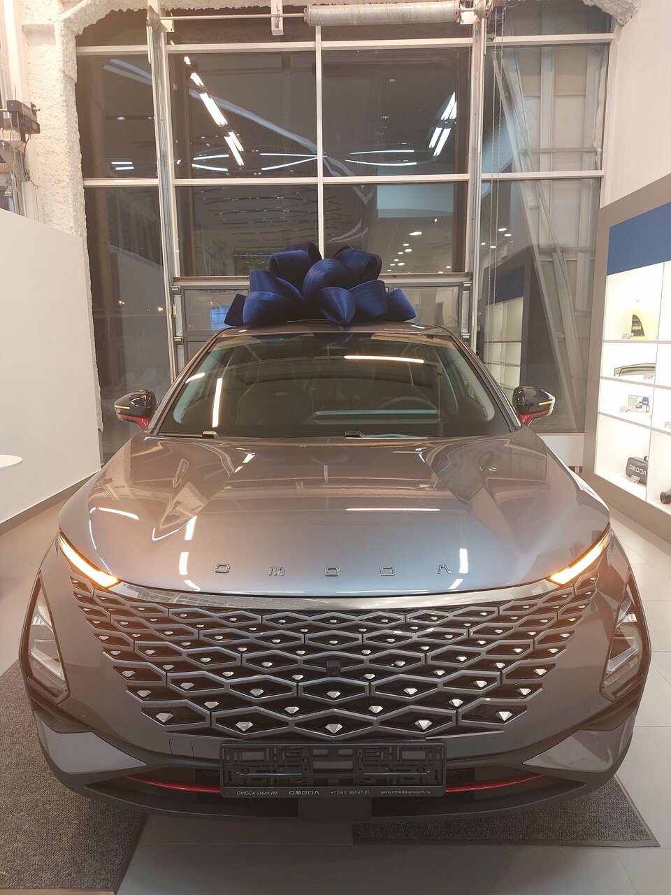 photo Уникум, Omoda