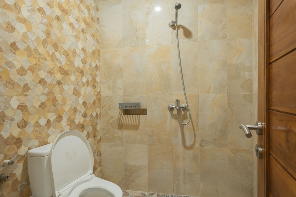 Фото Liliy Guest House Legian