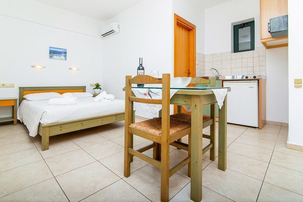 Фото Dionysos Apartments & Studios