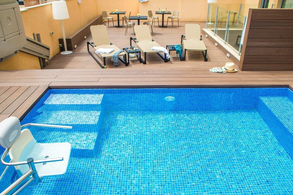 Фото Arya Stadium Hotel