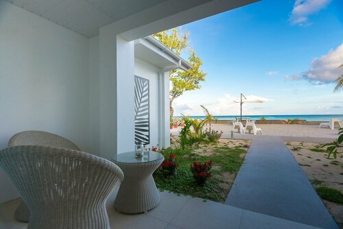 Апартаменты Le Nautique Luxury Beachfront Apartments
