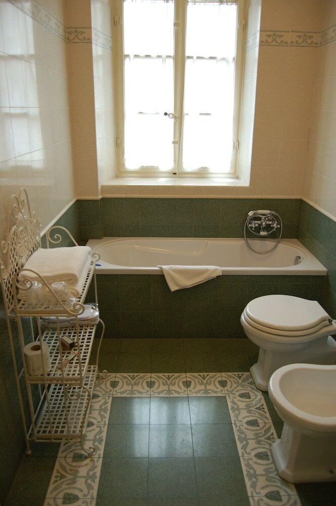 Фото Palazzo Tucci Residenza d'Epoca