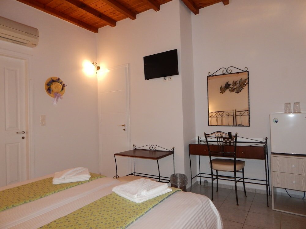 Фото Tinos Suites & Apartments