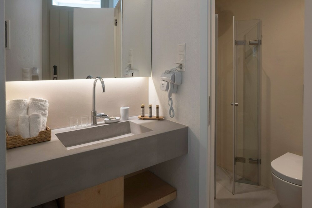 Фото L Anima Boutique Suites