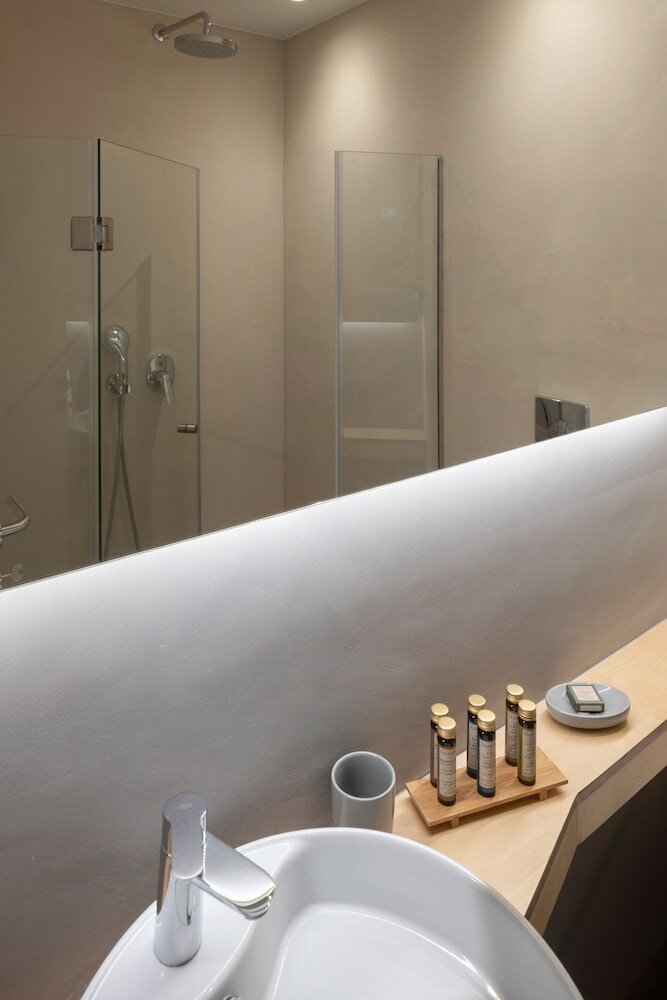 Фото L Anima Boutique Suites