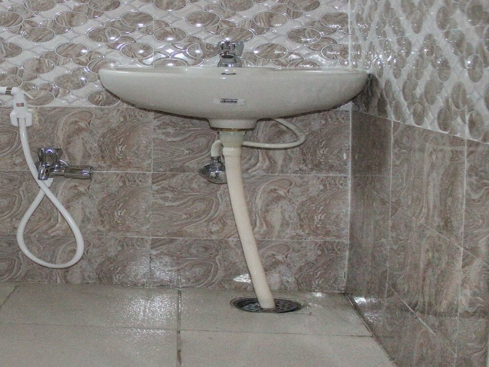 Фото Oyo 12840 Sri Guru Residency