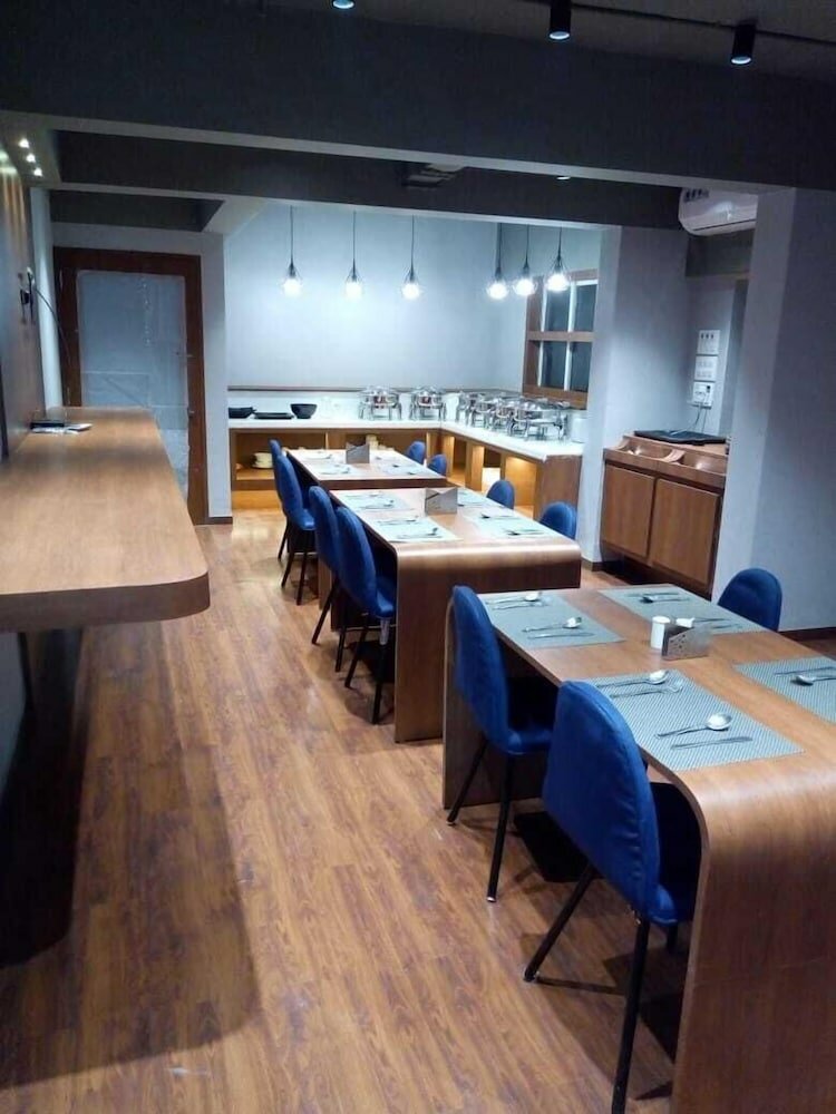 Фото Mint Magna Suites