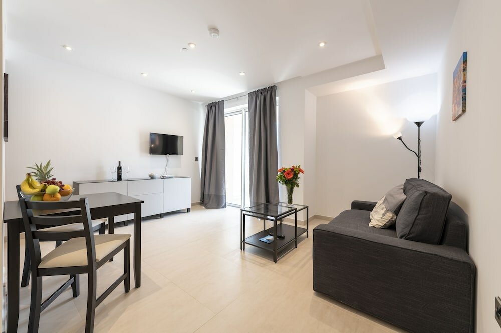 Фото Bentley Holiday Apartments - West One