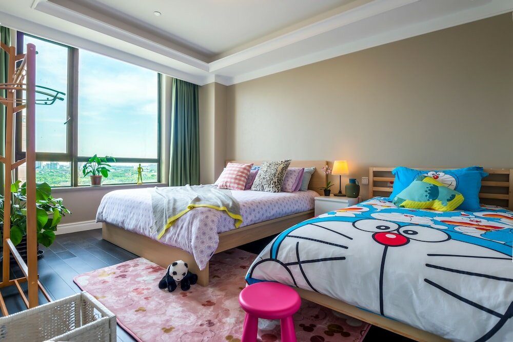 Фото Shanghai Xinchuan Boutique Apartment