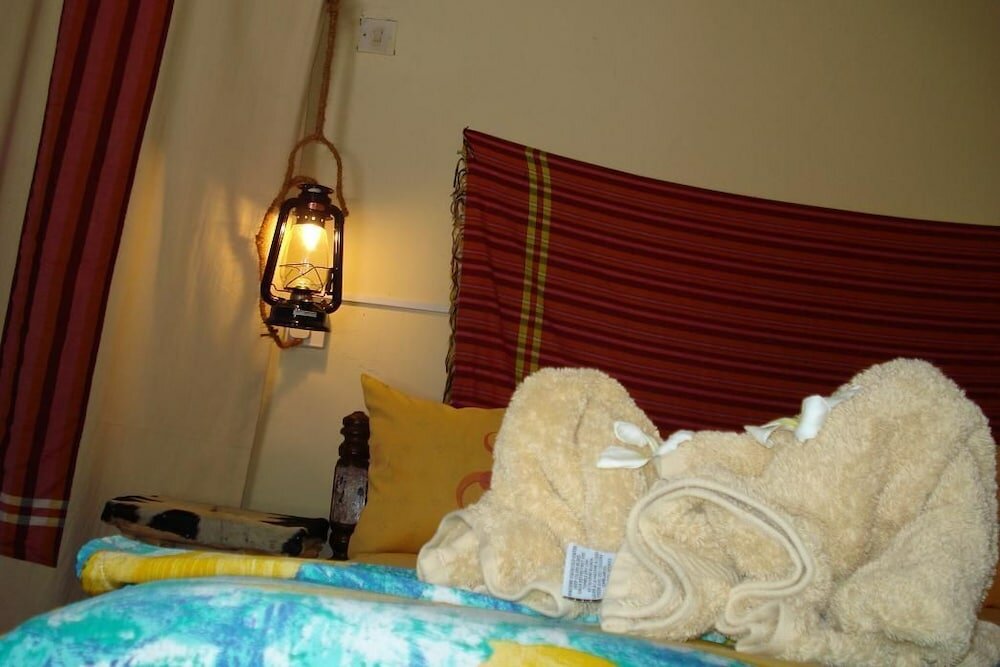 Фото Twisted Palms Lodge & Restaurant