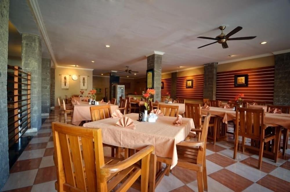 Фото Taman Rosani Hotel