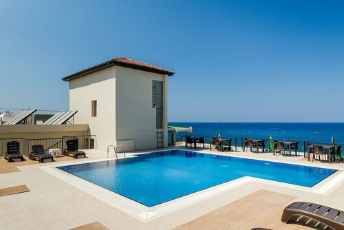 Гостиница Olivia Palm Hotel в Кирении