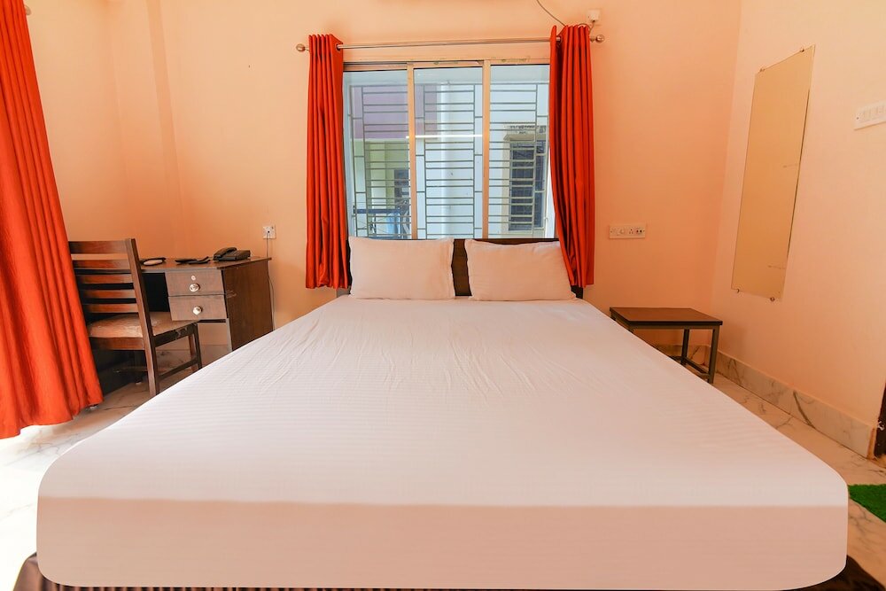 Фото Fabhotel Ashraya Inn