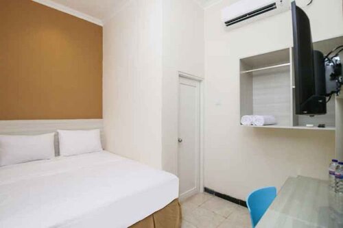 Гостиница Kertajaya Residence Syariah Surabaya в Сурабае