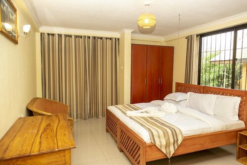 Гостиница Runako Lodge в Аруше