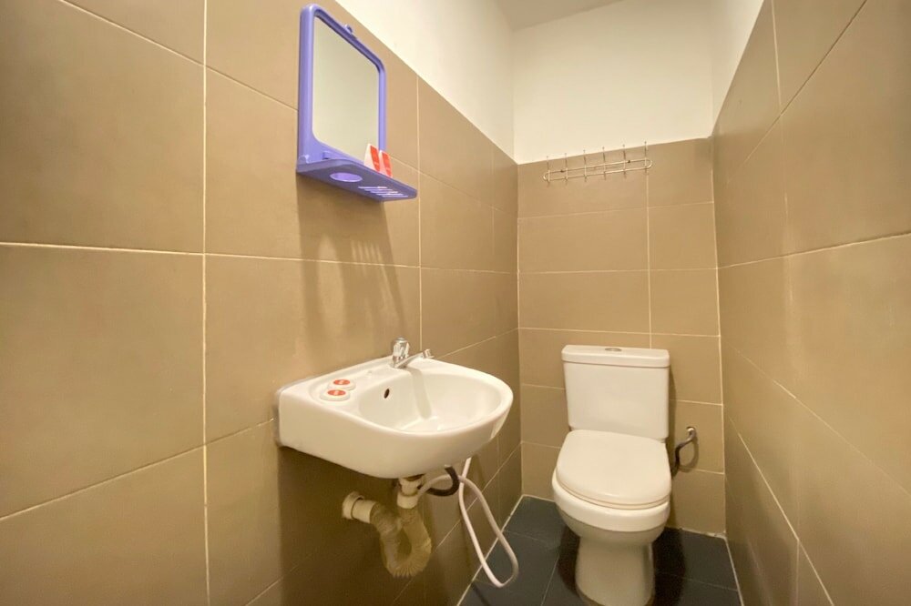 Фото Spot On 90283 27 Muntri