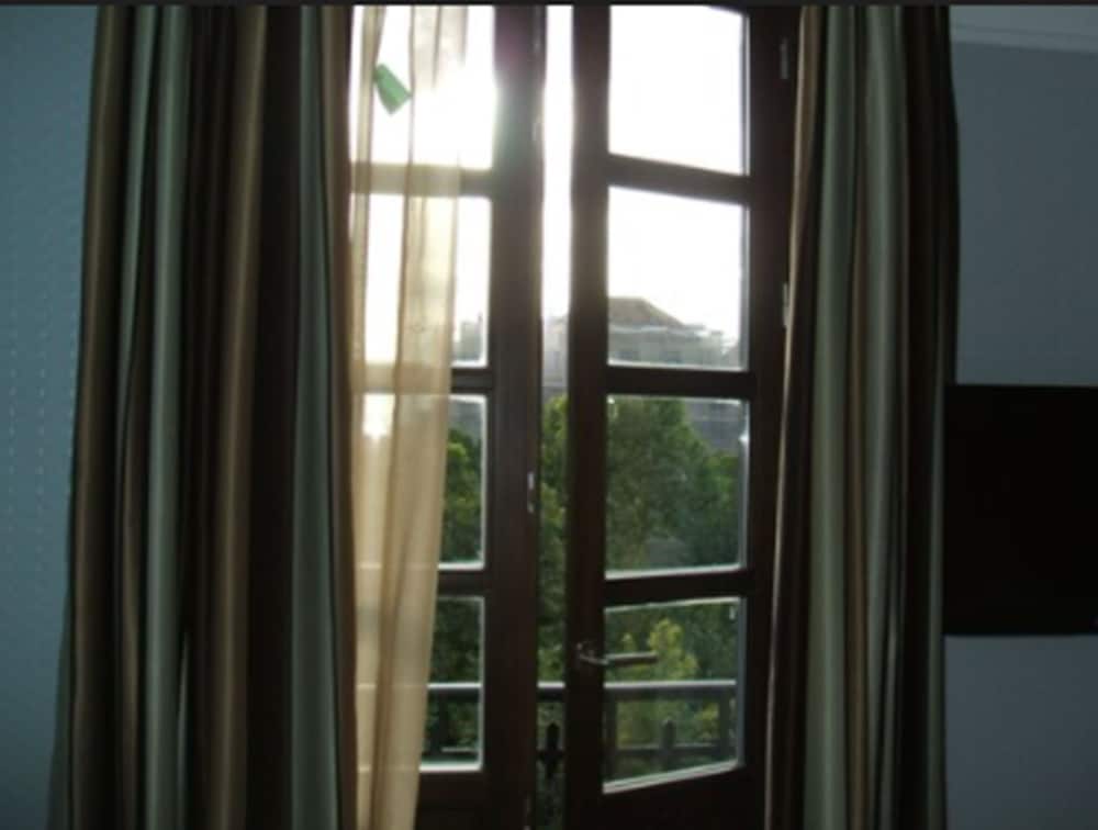 Фото La Casa de La Trinidad Hotel