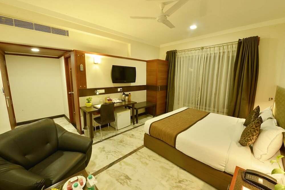 Фото Amantra Comfort Hotel